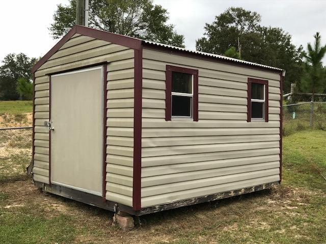 4036 Poverty Creek Road Crestview, FL 32539 - Photo 15 of 24 a view of a house with a yard
