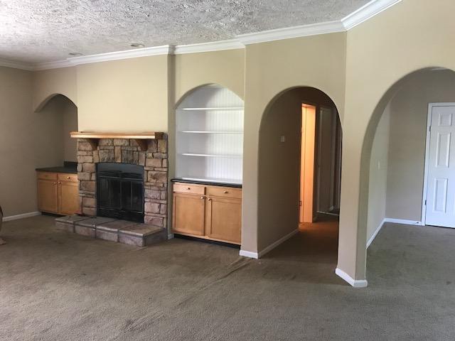 4036 Poverty Creek Road Crestview, FL 32539 - Photo 5 of 24 a view of livingroom with furniture and fireplace