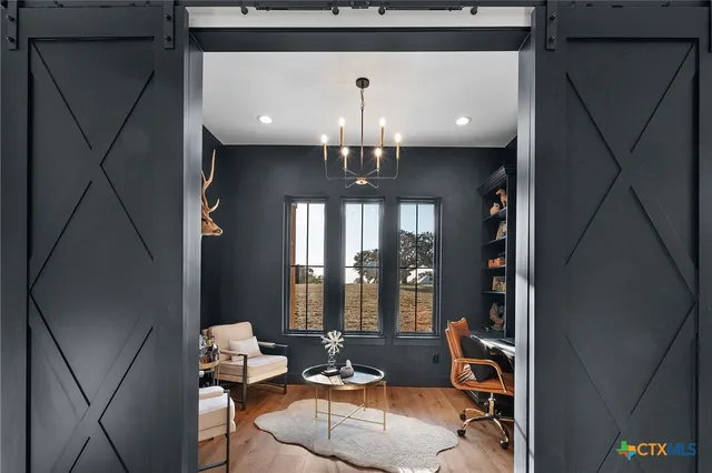 a lobby with furniture and window