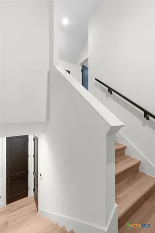a view of hallway with stairs
