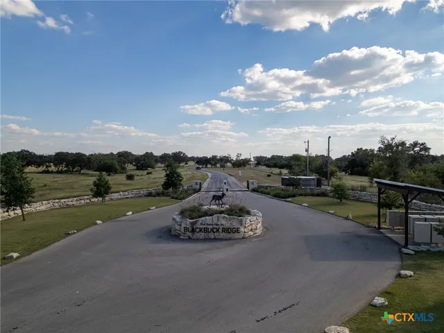 a big yard with table and chairs