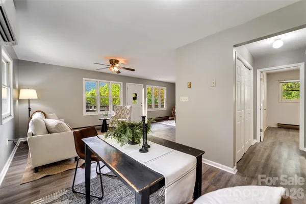 a view of a livingroom with furniture and window
