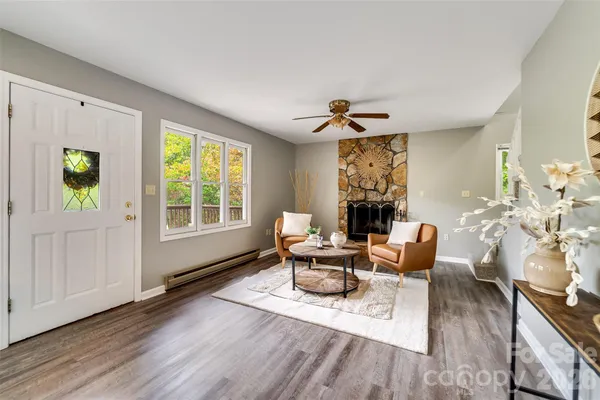 a living room with furniture and a window