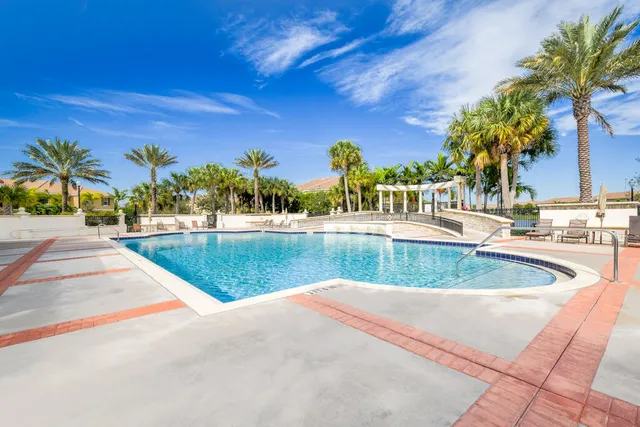 a view of a swimming pool with a patio