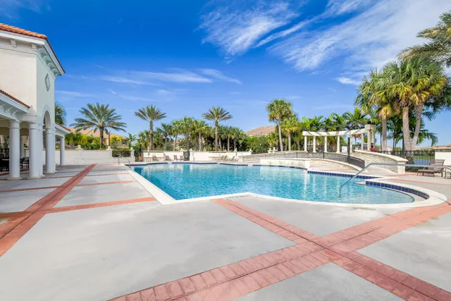 a view of swimming pool with a yard