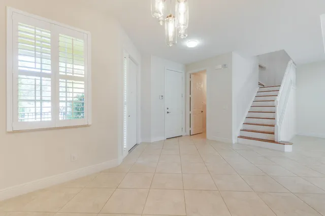 a view of a livingroom with a staircase