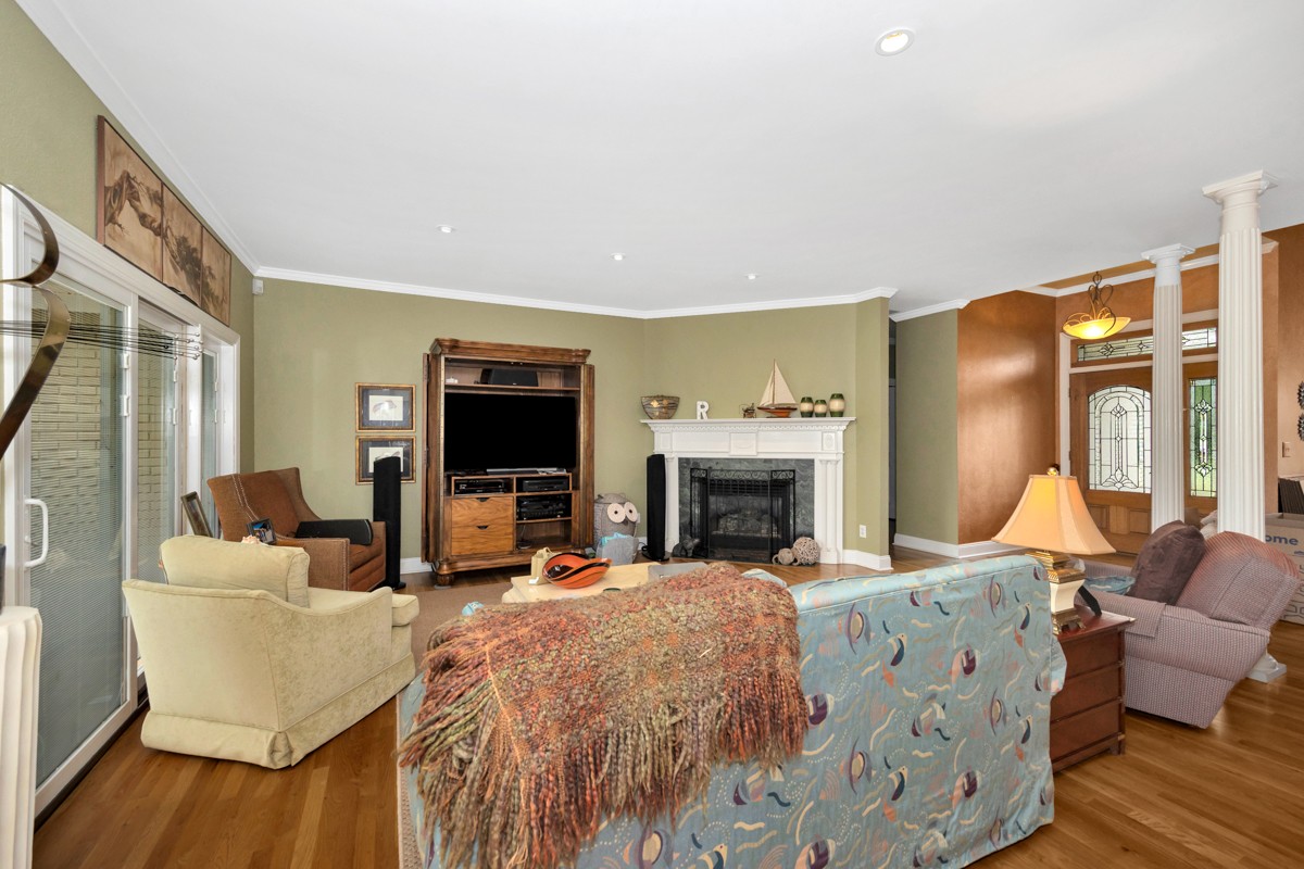332 Riverfront Road Rogersville, AL 35652 - Photo 12 of 52 a living room with furniture fireplace and flat screen tv