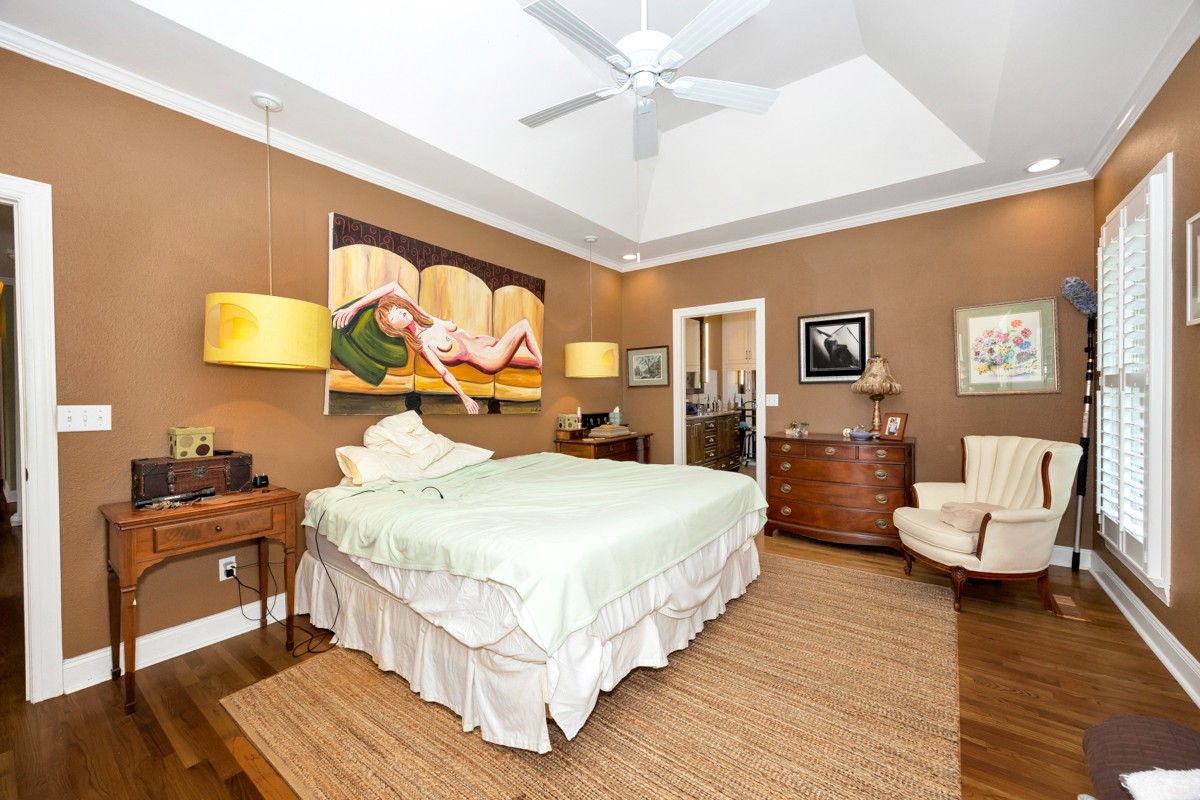 332 Riverfront Road Rogersville, AL 35652 - Photo 17 of 52 a bed room with a bed and dresser