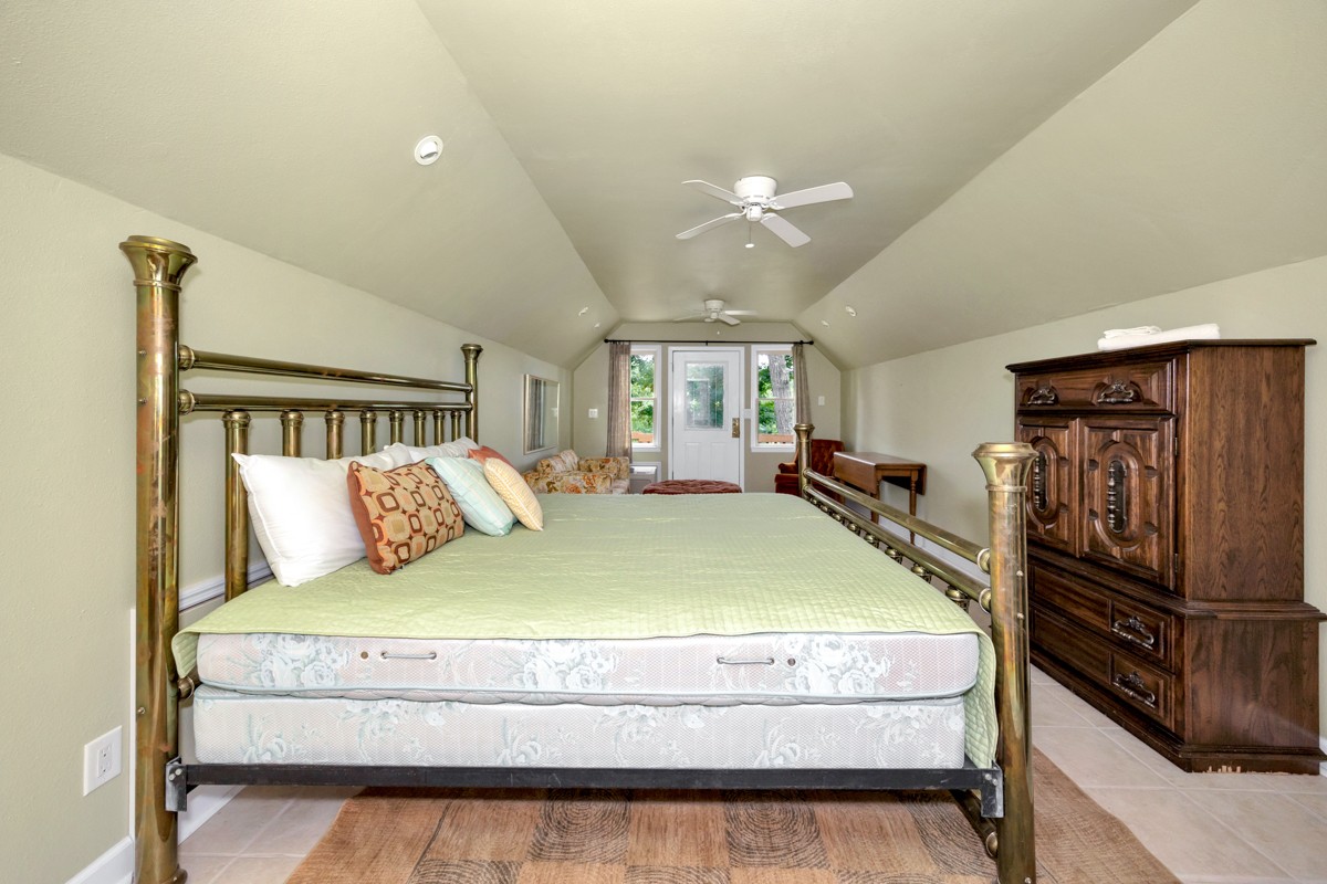 332 Riverfront Road Rogersville, AL 35652 - Photo 36 of 52 a bedroom with a bed and flat screen tv