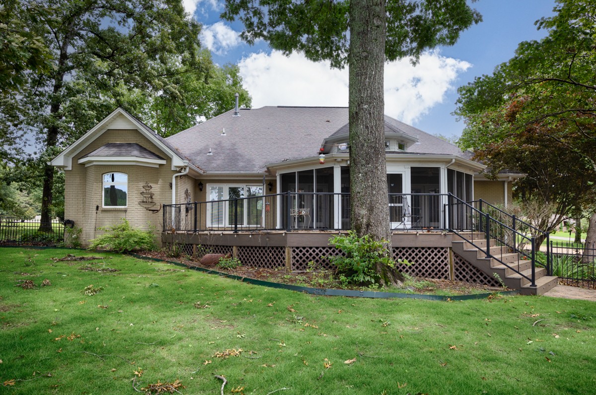 332 Riverfront Road Rogersville, AL 35652 - Photo 43 of 52 a front view of a house with a garden and yard