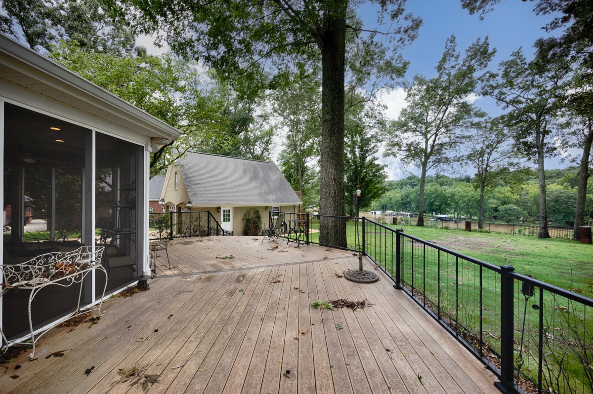 332 Riverfront Road Rogersville, AL 35652 - Photo 46 of 52 a view of a house with a patio