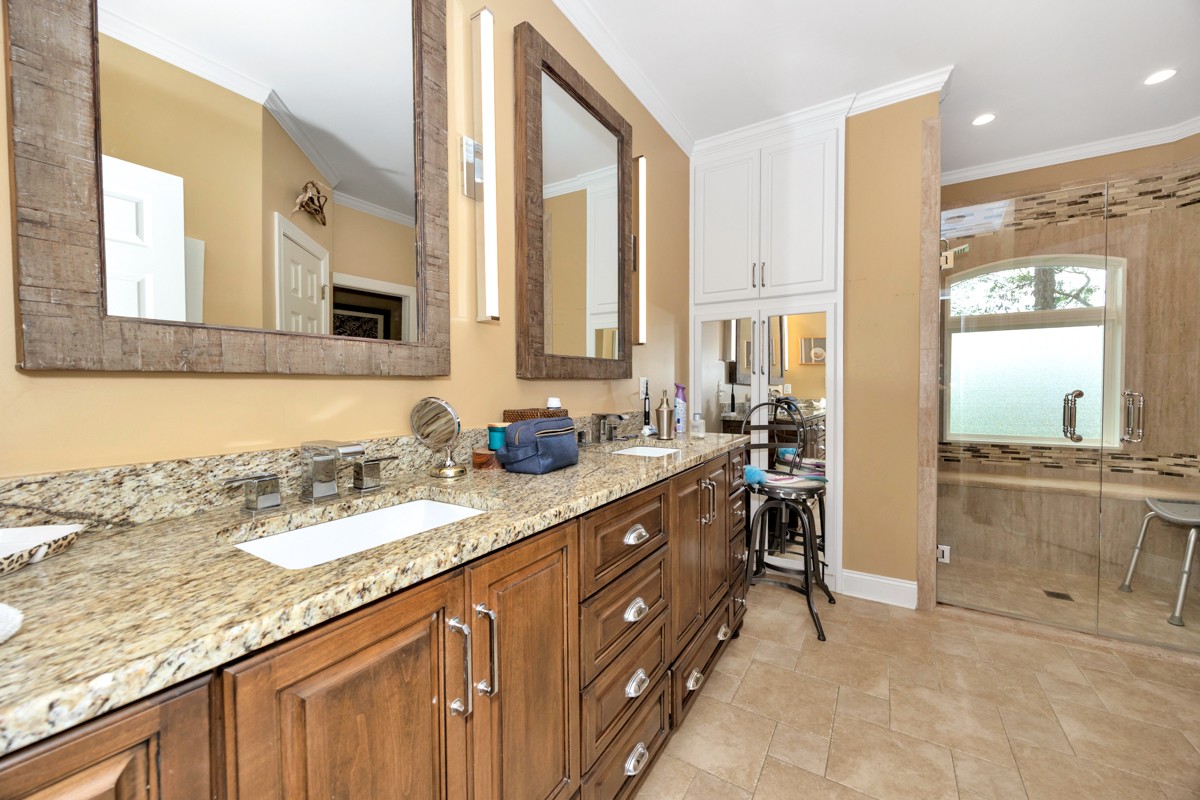 332 Riverfront Road Rogersville, AL 35652 - Photo 9 of 52 a spacious bathroom with a granite countertop sink mirror and a