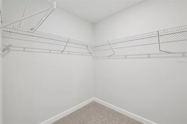 a bathroom with a sink vanity toilet and shower