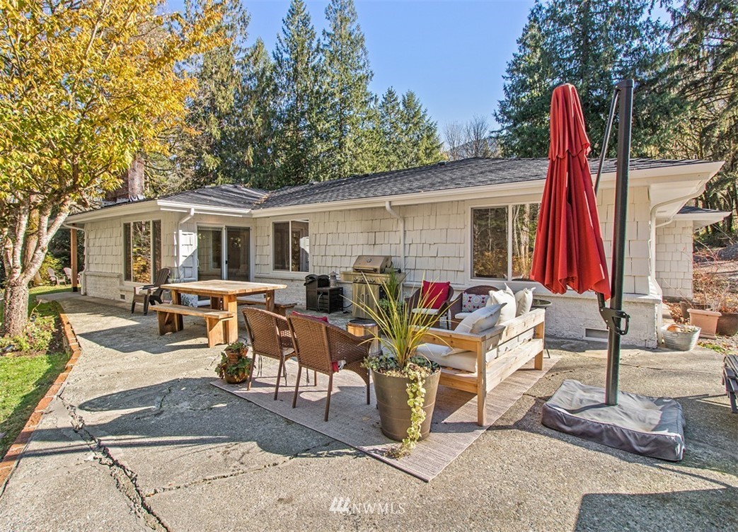 46020 Southeast Edgewick Road North Bend, WA 98045 - Photo 19 of 24 a view of a dinning table and chairs in patio