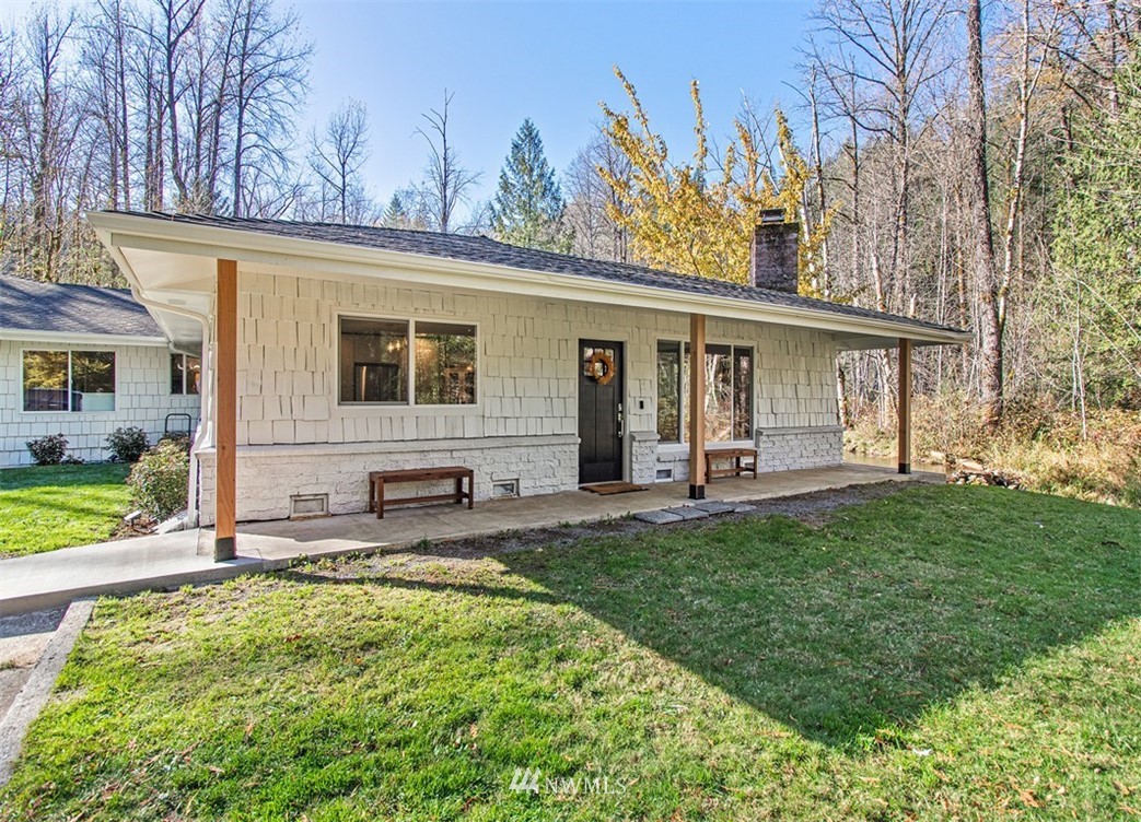 46020 Southeast Edgewick Road North Bend, WA 98045 - Photo 20 of 24 a view of a house with backyard and sitting area