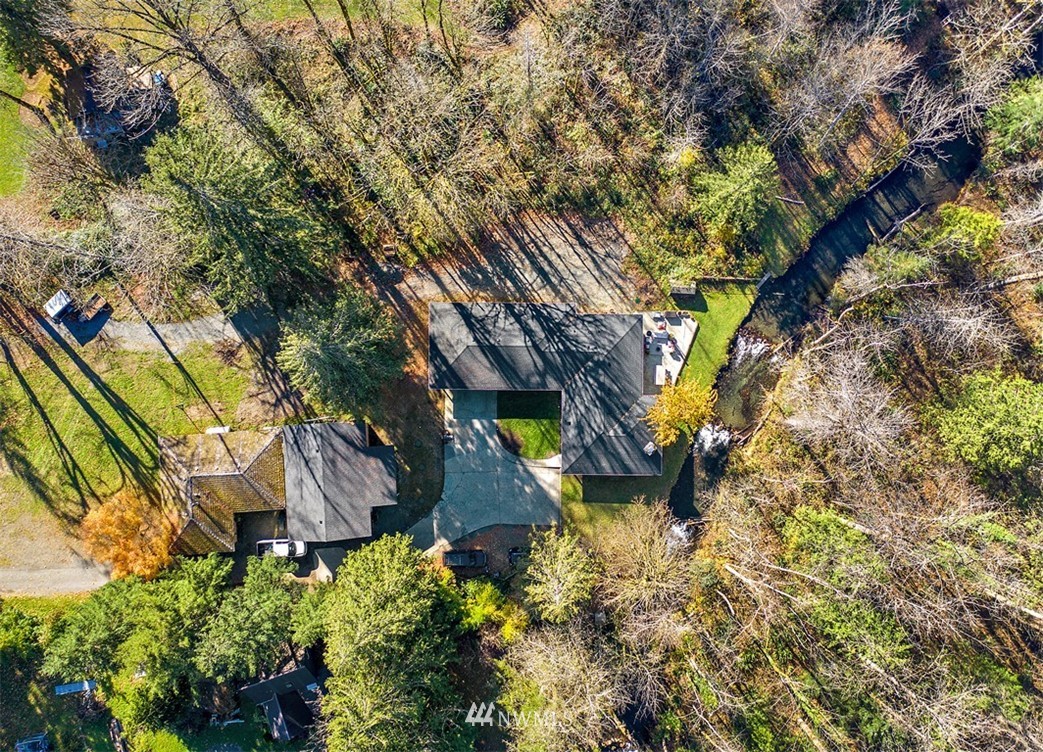 46020 Southeast Edgewick Road North Bend, WA 98045 - Photo 24 of 24 a backyard of a house with lots of green space