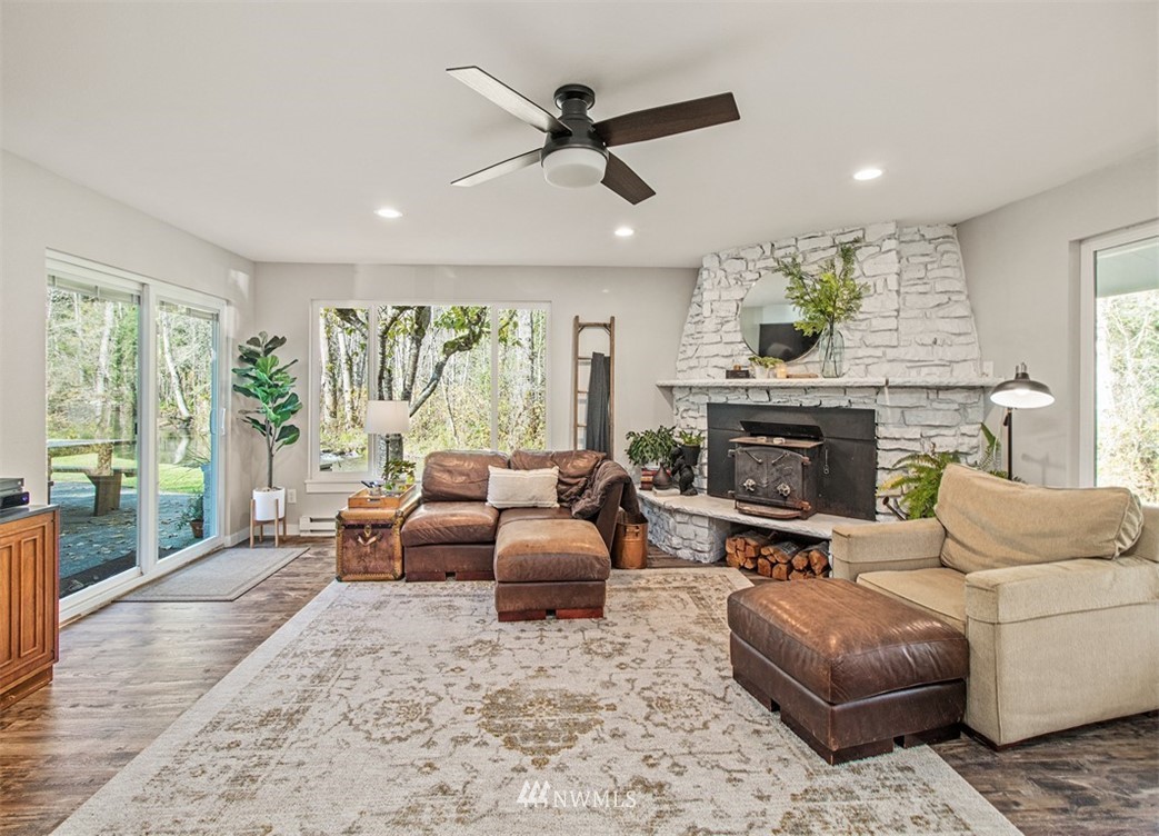 46020 Southeast Edgewick Road North Bend, WA 98045 - Photo 6 of 24 a living room with furniture fireplace and a large window