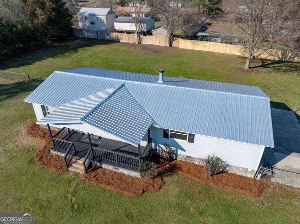 a view of a terrace with yard