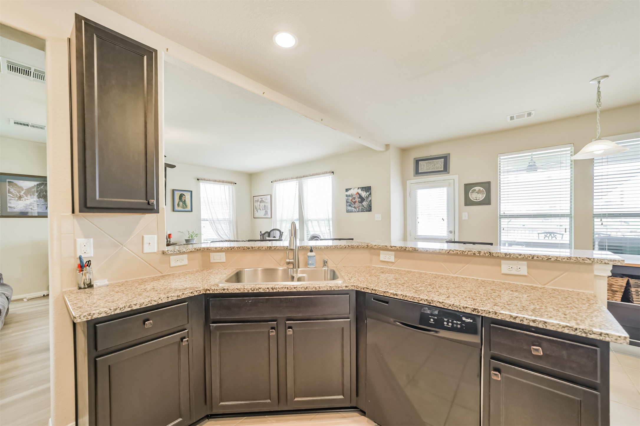 12009 La Salle River Road Conroe, TX 77304 - Photo 17 of 50 a kitchen with a sink and a window