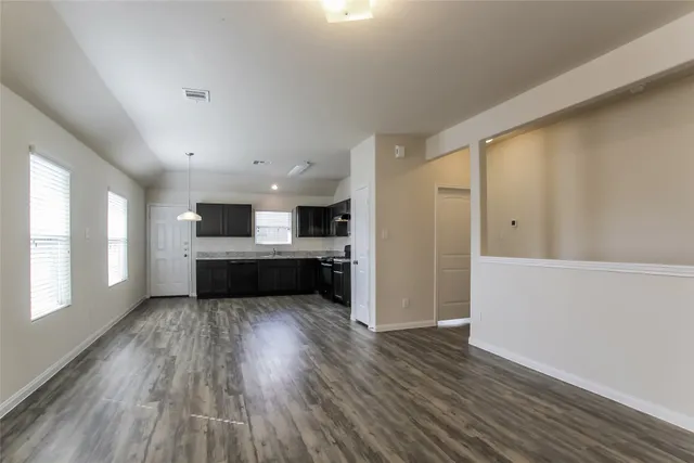a view of kitchen with wooden floor