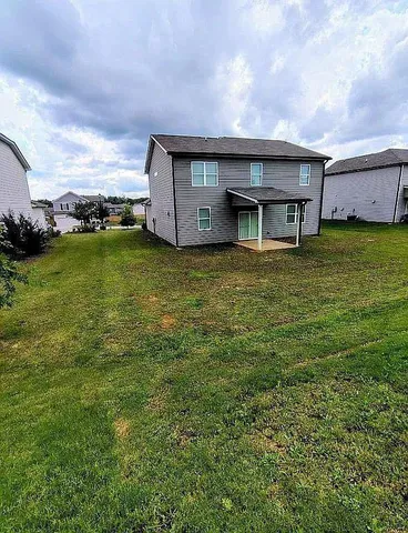 a house view with a garden space