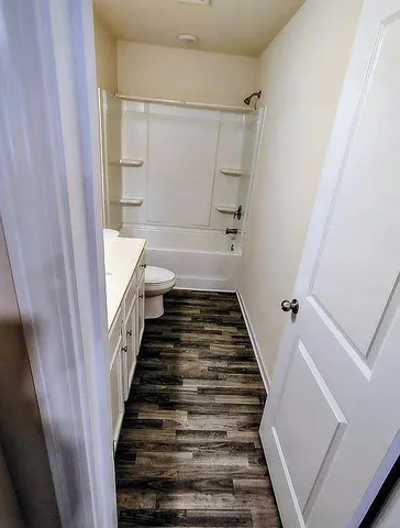 a view of a hallway view with staircase