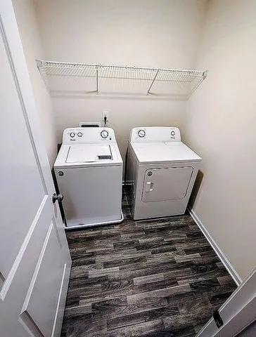 a utility room with dryer and washer