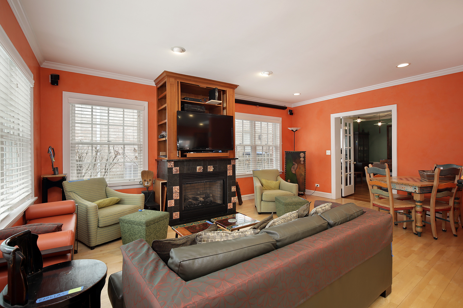 917 Oxford Road Deerfield, IL 60015 - Photo 6 of 19 a living room with furniture a large window and a fireplace