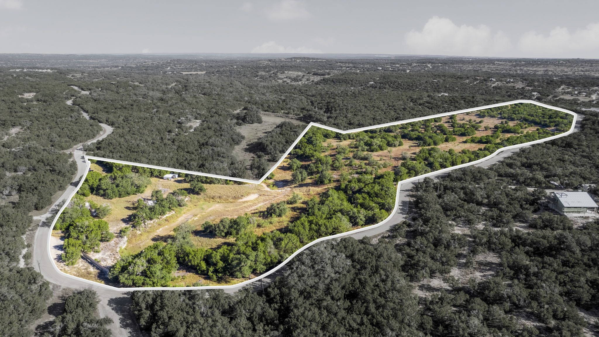 a view of a backyard with sitting area