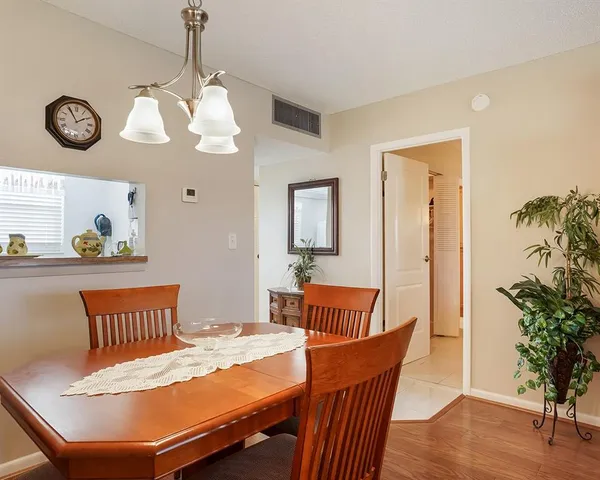 a view of a dining room with furniture