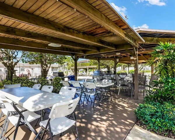 a view of yard with patio