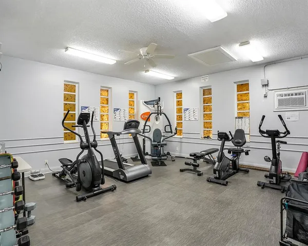 a view of a room with gym equipment