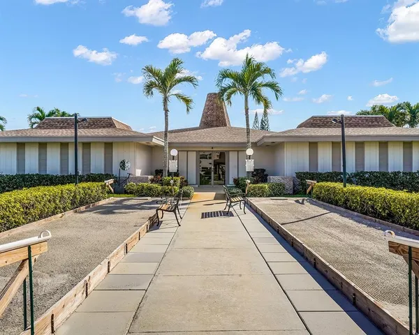 a view of a house with sitting area and furniture
