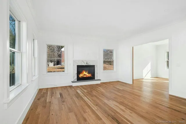 a bathroom with a bathtub and window