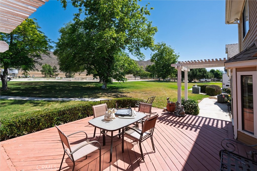 34150 Stowe Road Winchester, CA 92545 - Photo 75 of 80 a view of a patio with a table and chairs