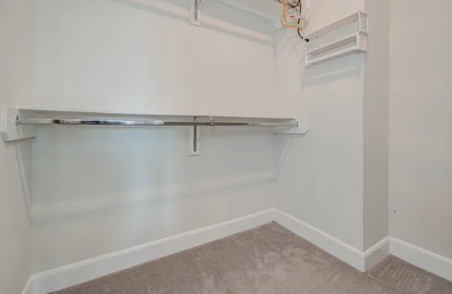 a view of an empty walk in closet