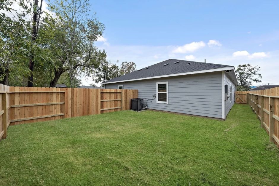 5222 Bataan Road Houston, TX 77033 - Photo 21 of 22 Expansive backyard offering privacy, simplicity, and the perfect setting for outdoor relaxation or entertaining guests.