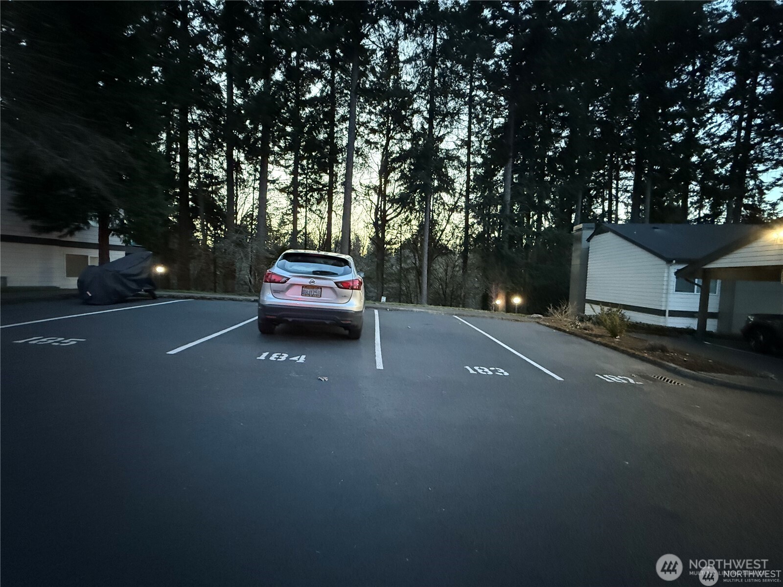 31500 33rd Place Southwest, Unit U101 Federal Way, WA 98023 - Photo 25 of 27 a car parked on the side of the road