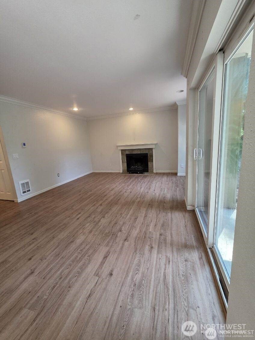 31500 33rd Place Southwest, Unit U101 Federal Way, WA 98023 - Photo 8 of 27 a view of a livingroom with wooden floor