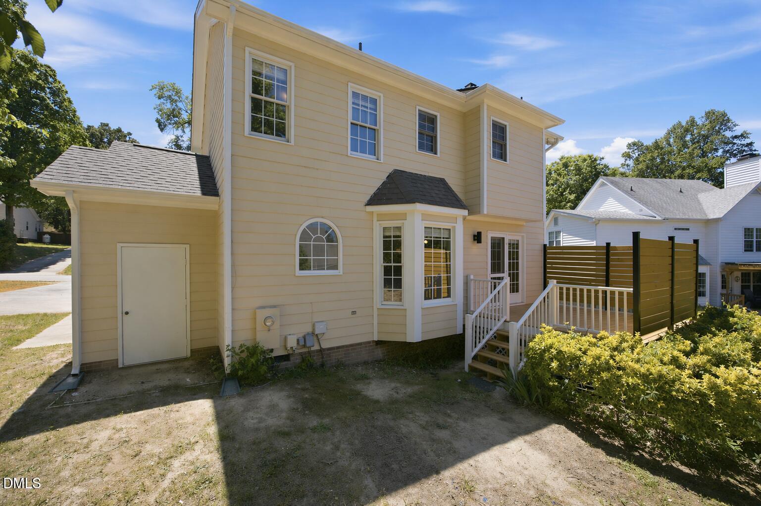 4107 Breadfruit Court Raleigh, NC 27616 - Photo 25 of 28 Side picture of breadfruit Ct back of ho