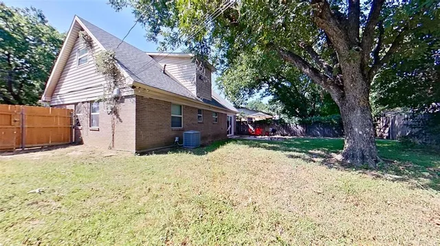 a house with trees in front of it