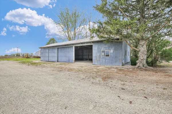 a house with a tree in front of it