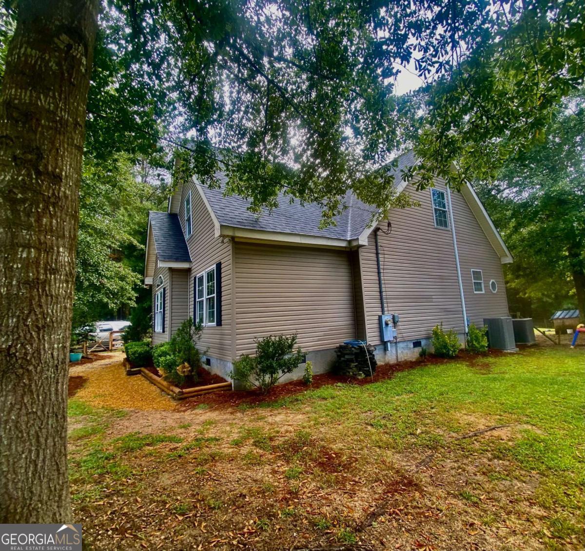 290 Poplar Creek Road Stephens, GA 30667 - Photo 11 of 68 a view of a yard in front of house
