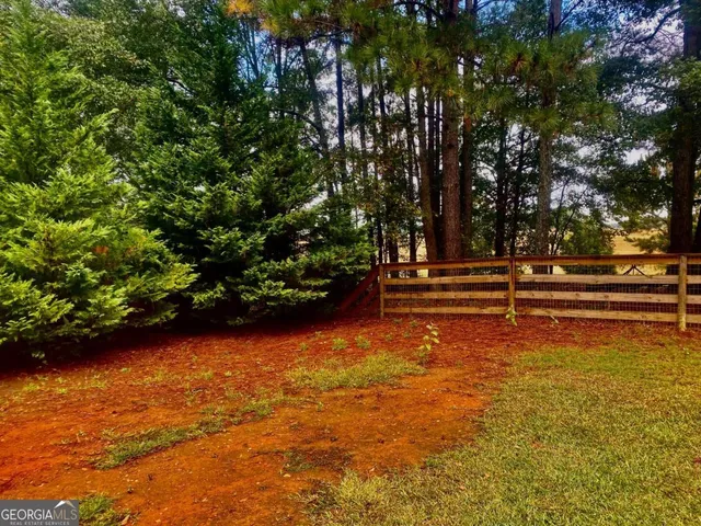a view of wooden floor and cabinet