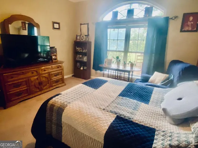 a view of staircase and closet