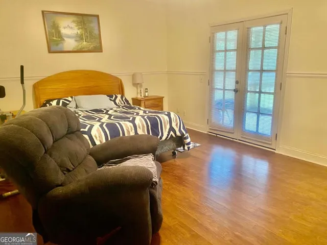 a kitchen with a sink a stove and cabinets