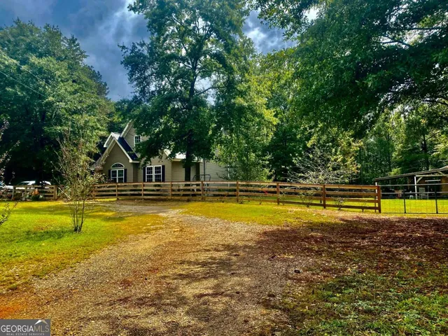 a view of a street with a tree