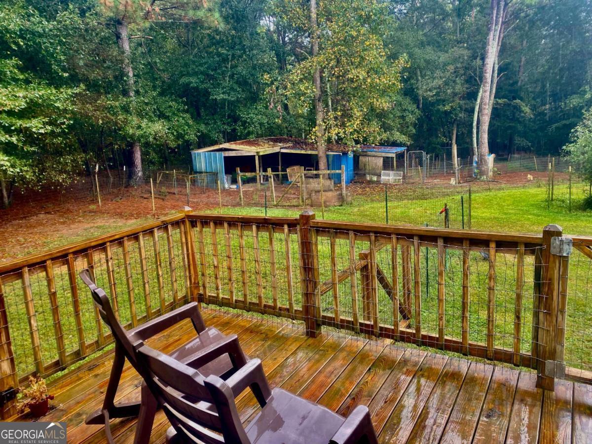 290 Poplar Creek Road Stephens, GA 30667 - Photo 65 of 68 swimming pool view with a seating space