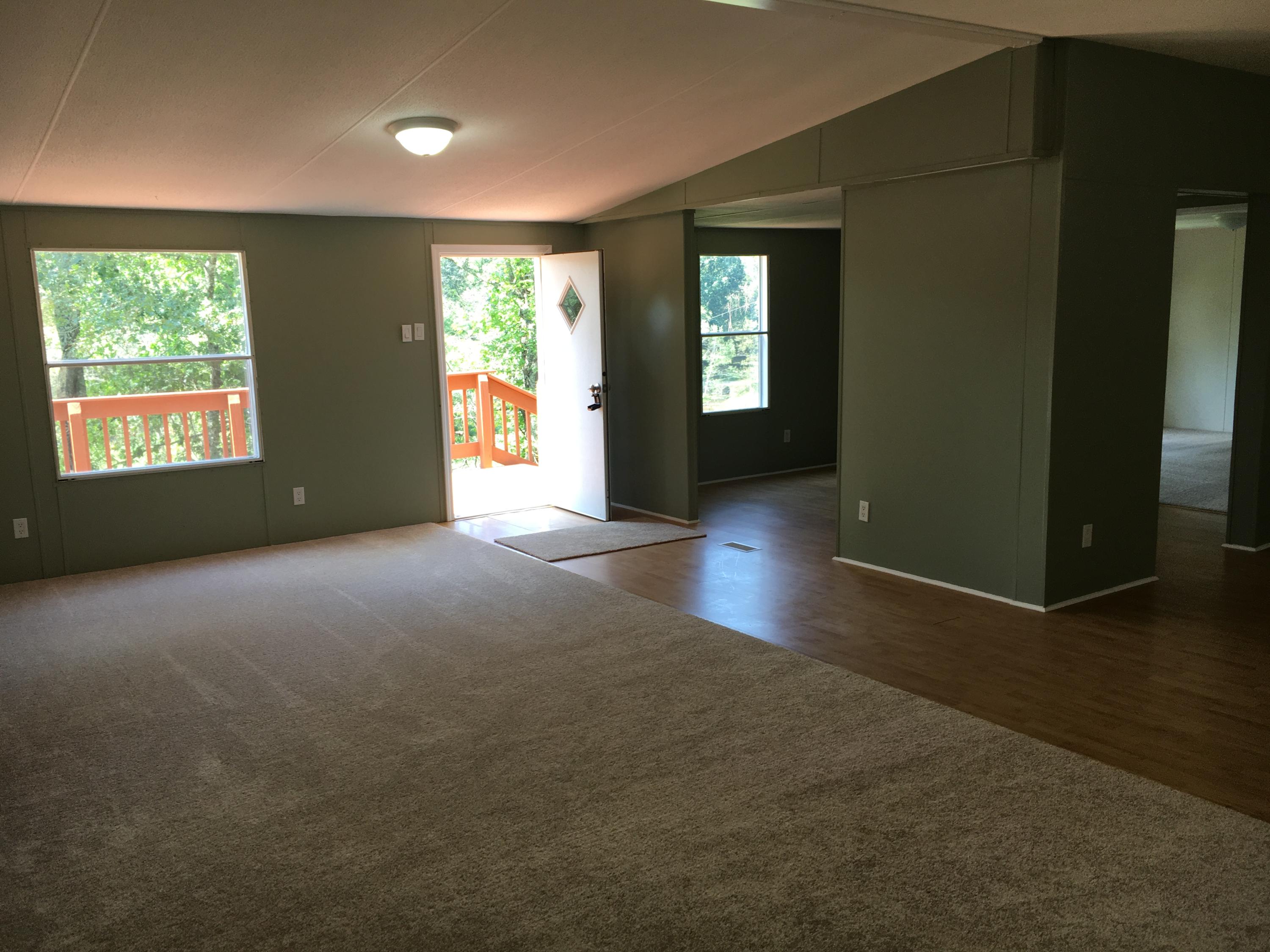 2205 Conner Grove Road Southwest Willis, VA 24380 - Photo 3 of 18 an empty room with windows