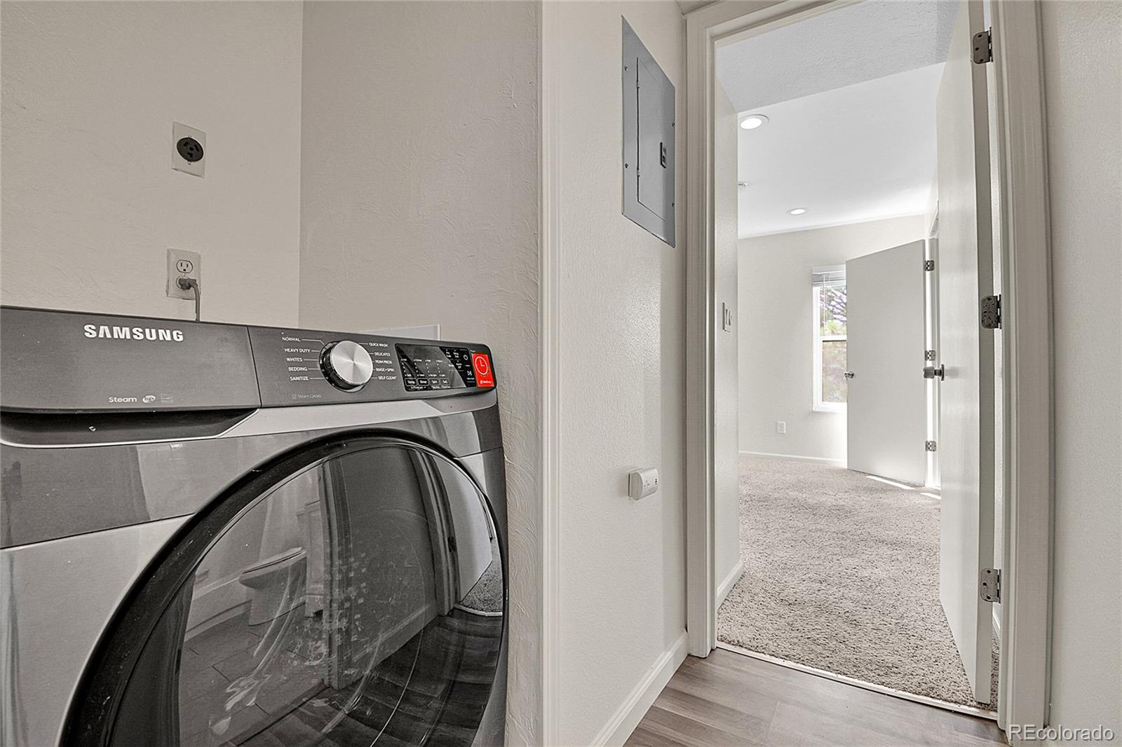 539 Wright Street, Unit 301 Lakewood, CO 80228 - Photo 15 of 32 a view of livingroom with washer and dryer